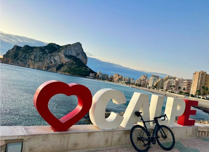 Cycling in Calpe with the Peñón de Ifach in the background